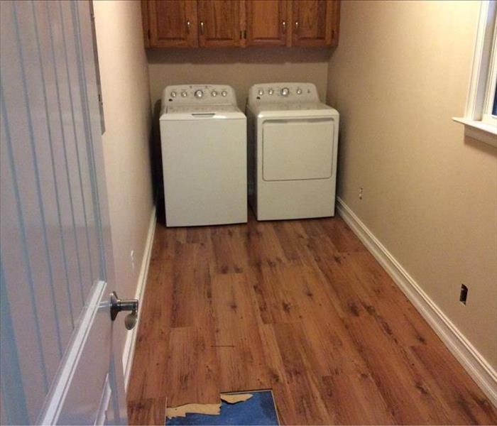 Photo of a flooded utility room
