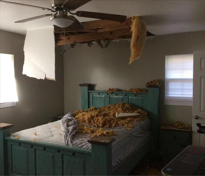 Damage to a ceiling in bedroom of home
